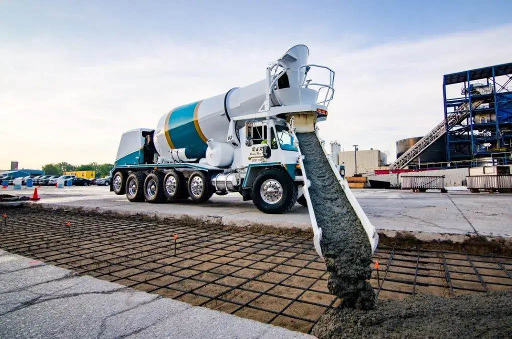 Ready-mixed concrete poured by truck-mounted transit mixers. Ready mixed concrete is one of the types of concrete. 