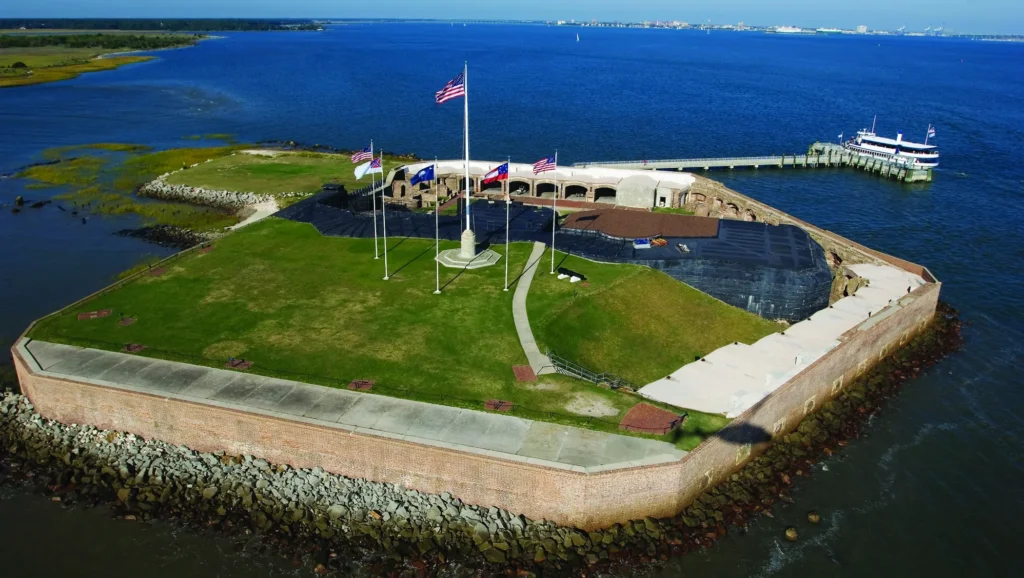 Aerial view of Fort Sumter, offering a bird's-eye perspective of the historic fortification situated on an island in Charleston Harbor, showcasing its walls, cannons, and surrounding natural beauty